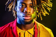 Firefly-bueatiful-black-man-with-afro-dreadlock-hair-dressed-in-complimental-color-clothing-photogr-2